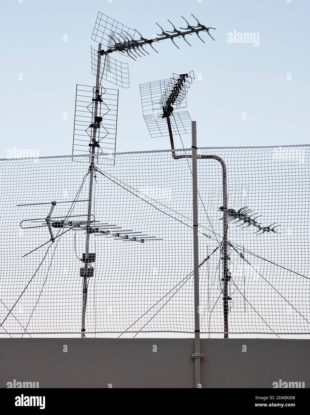 Old fashioned antennas on roof Stock Photo - Alamy