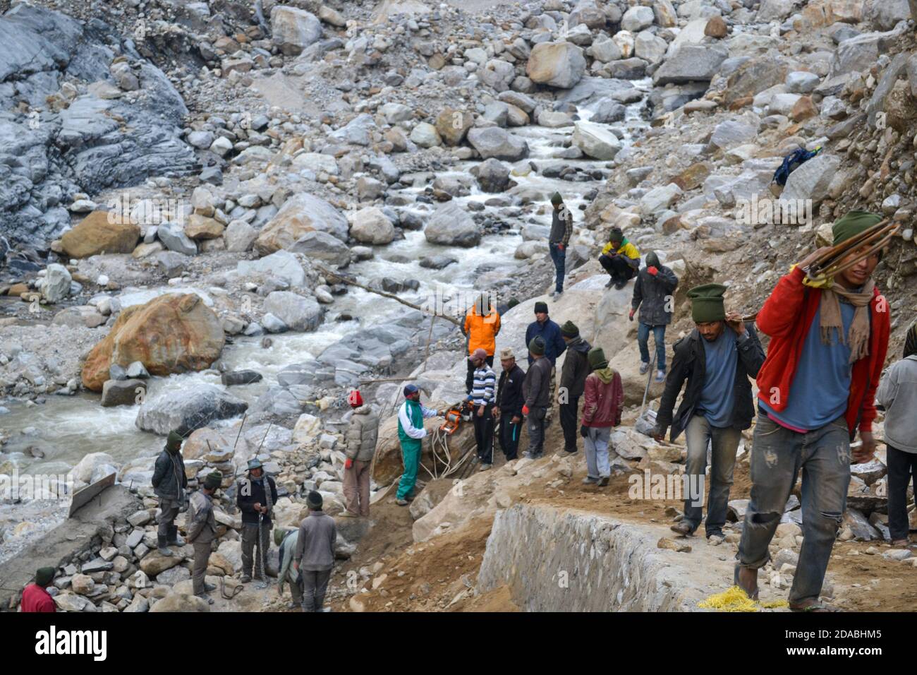 Rudarprayag, Uttarakhand, India, April 26 2014, Labor working for Kedarnath reconstruction after disaster. Portions of the Himalayan shrine in Uttarakhand were damaged in flash floods in 2013, after which the reconstruction work start.  Stock Photo