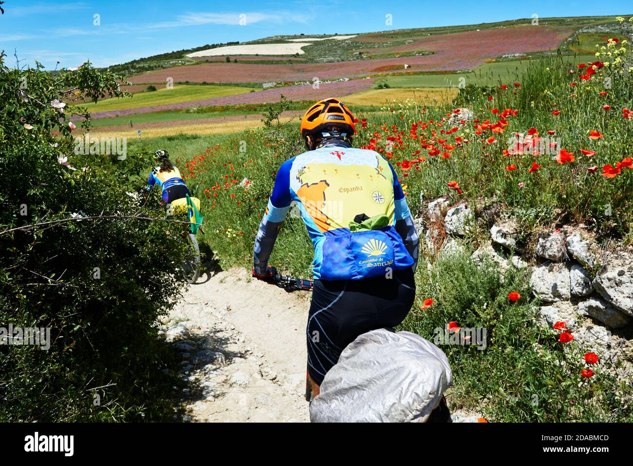 Bike pilgrims. French Way, Way of St. James. Hontanas, Burgos, Castile and Leon, Spain, Europe Stock Photo
