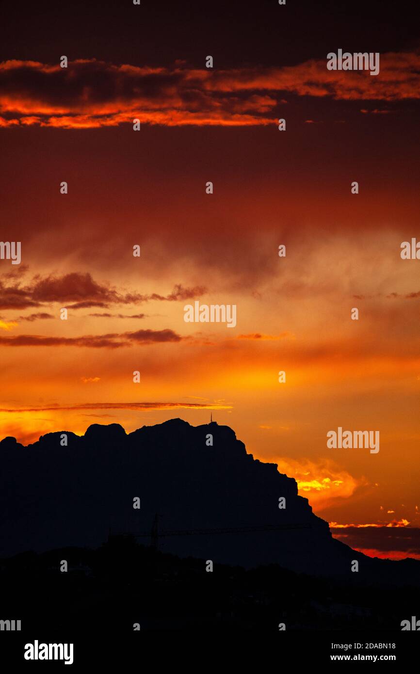 June sunset on the mountain of Montserrat, near Barcelona, Catalonia, Spain Stock Photo