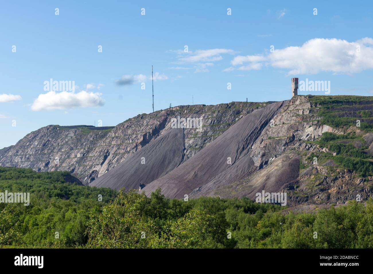 View from Kiruna city over the mine with a blue sky in backkground and the new park that will grow instead of the moving town in foreground. Stock Photo