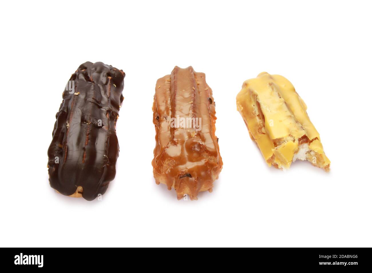 Three eclairs with different creams isolated on a white background Stock Photo