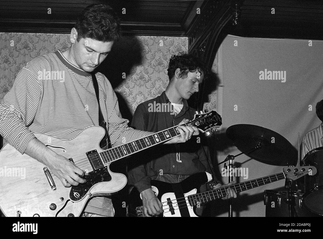 Monochrome image of Gordon Keen and Gerard Love of Glasgow indie band BMX Bandits performing at Esquires, Bedford, UK, in 1990. Stock Photo