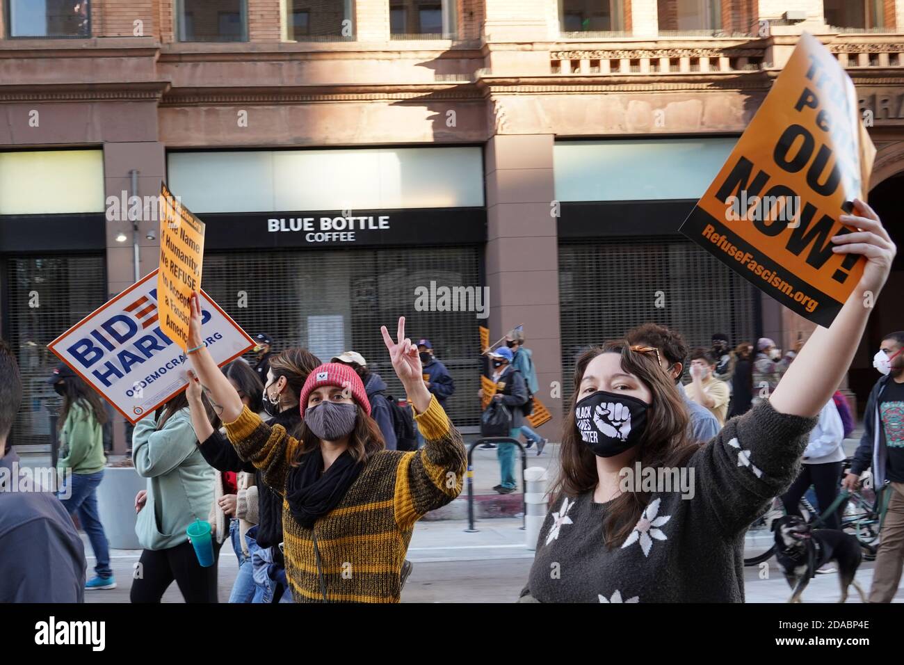 People march to celebrate the 2020 Election victory of Democratic presidential candidate Joe Biden over Republican incumbent Donald Trump on S. Broadway, Saturday, Nov. 7, 2020, in Los Angeles.  Photo via Newscom Stock Photo
