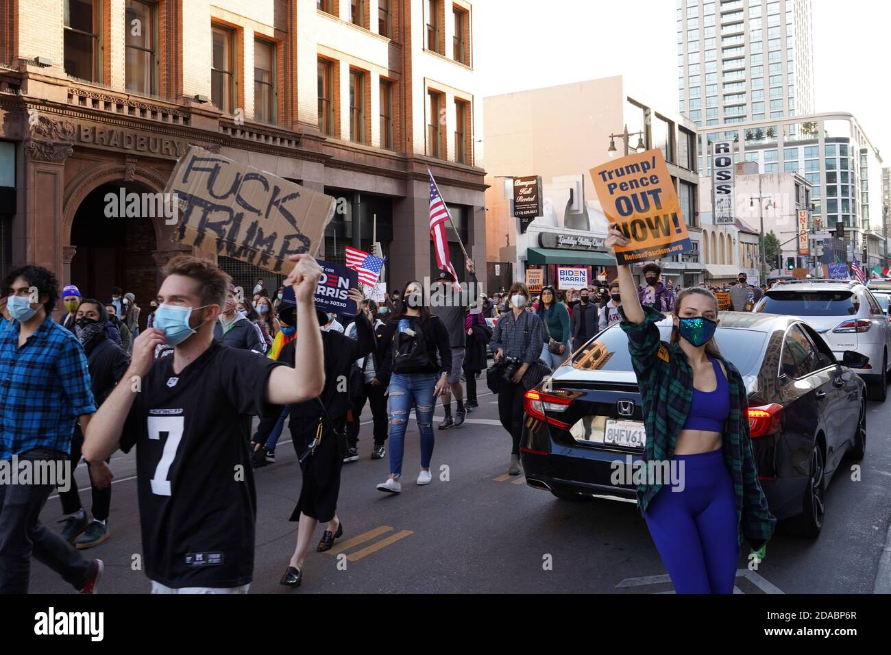 People march to celebrate the 2020 Election victory of Democratic presidential candidate Joe Biden over Republican incumbent Donald Trump on S. Broadway, Saturday, Nov. 7, 2020, in Los Angeles.  Photo via Newscom Stock Photo