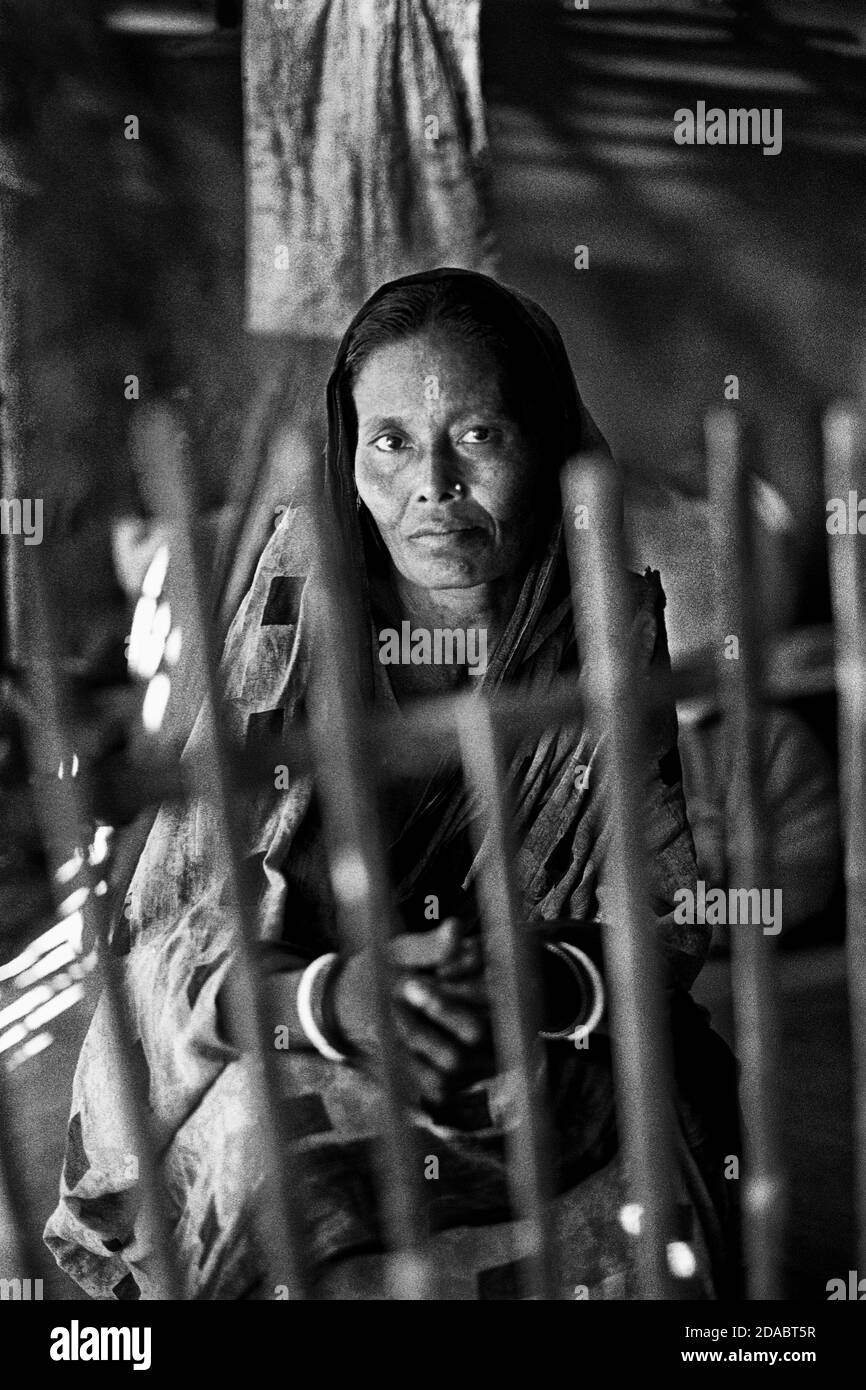Lothika Rani. The Naxalite movement was going to liberate them. It was a fight against oppression. Some would dress up as boys to sneak into the party meetings and listen to the speeches. She was one of many who left home to join the party. This movement was different. Women could be leaders, and take part in battle. Weddings were simple affairs. With a hand shake and a salute. Jessore, Bangladesh. Stock Photo