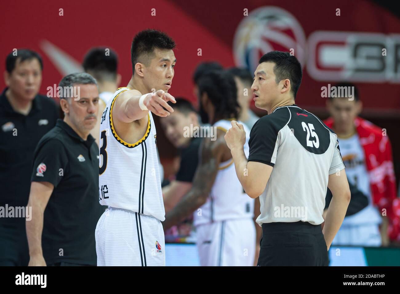 Zhuji, China's Zhejiang Province. 11th Nov, 2020. Guo Ailun (L, front) talks to 2nd referee Zhang Xiao during the 11th round match between Liaoning Flying Leopards and Jilin Northeast Tigers at the 2020-2021 season of the Chinese Basketball Association (CBA) league in Zhuji, east China's Zhejiang Province, Nov. 11, 2020. Credit: Jiang Han/Xinhua/Alamy Live News Stock Photo