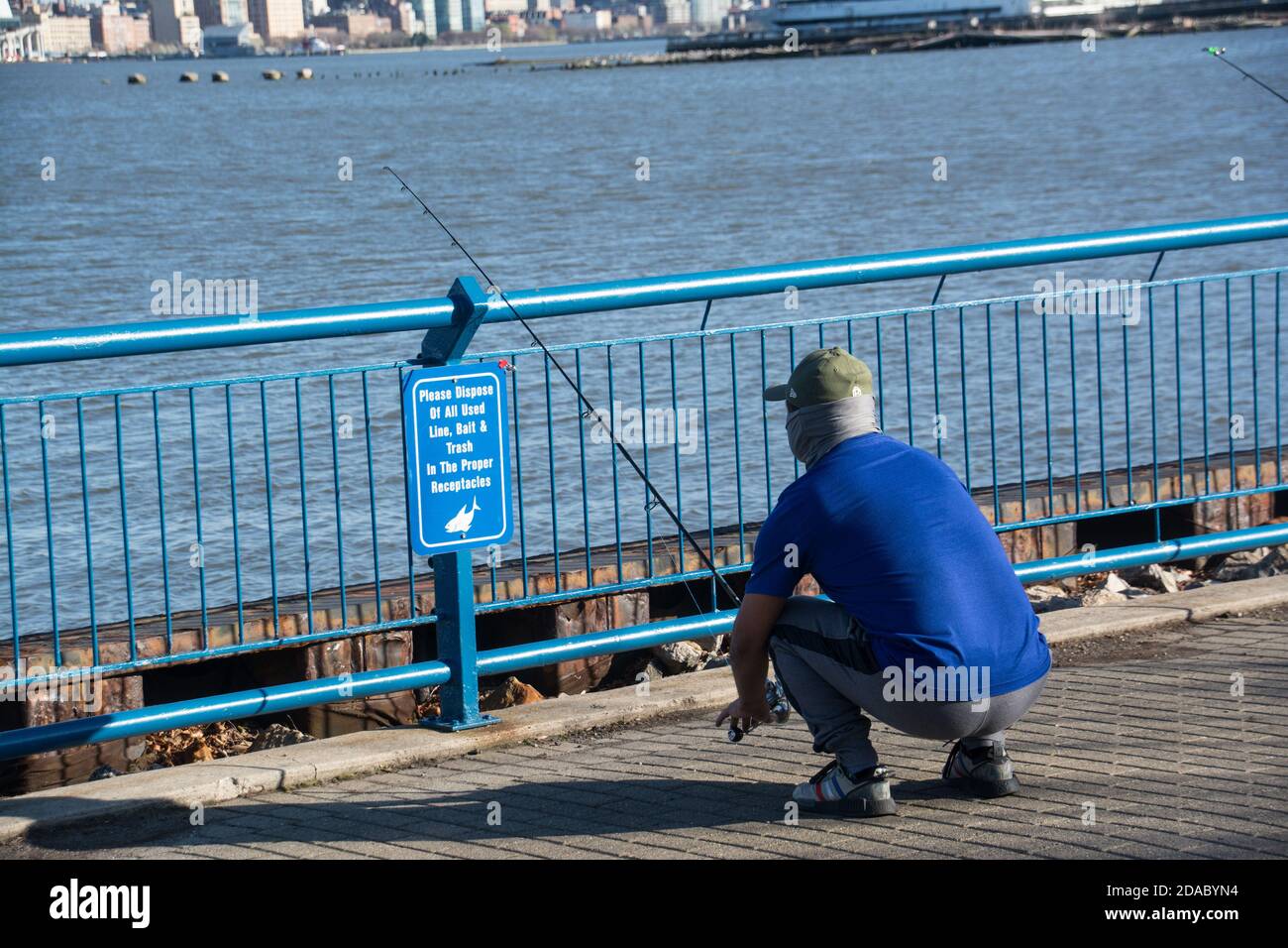 Fishing rod across hi-res stock photography and images - Alamy