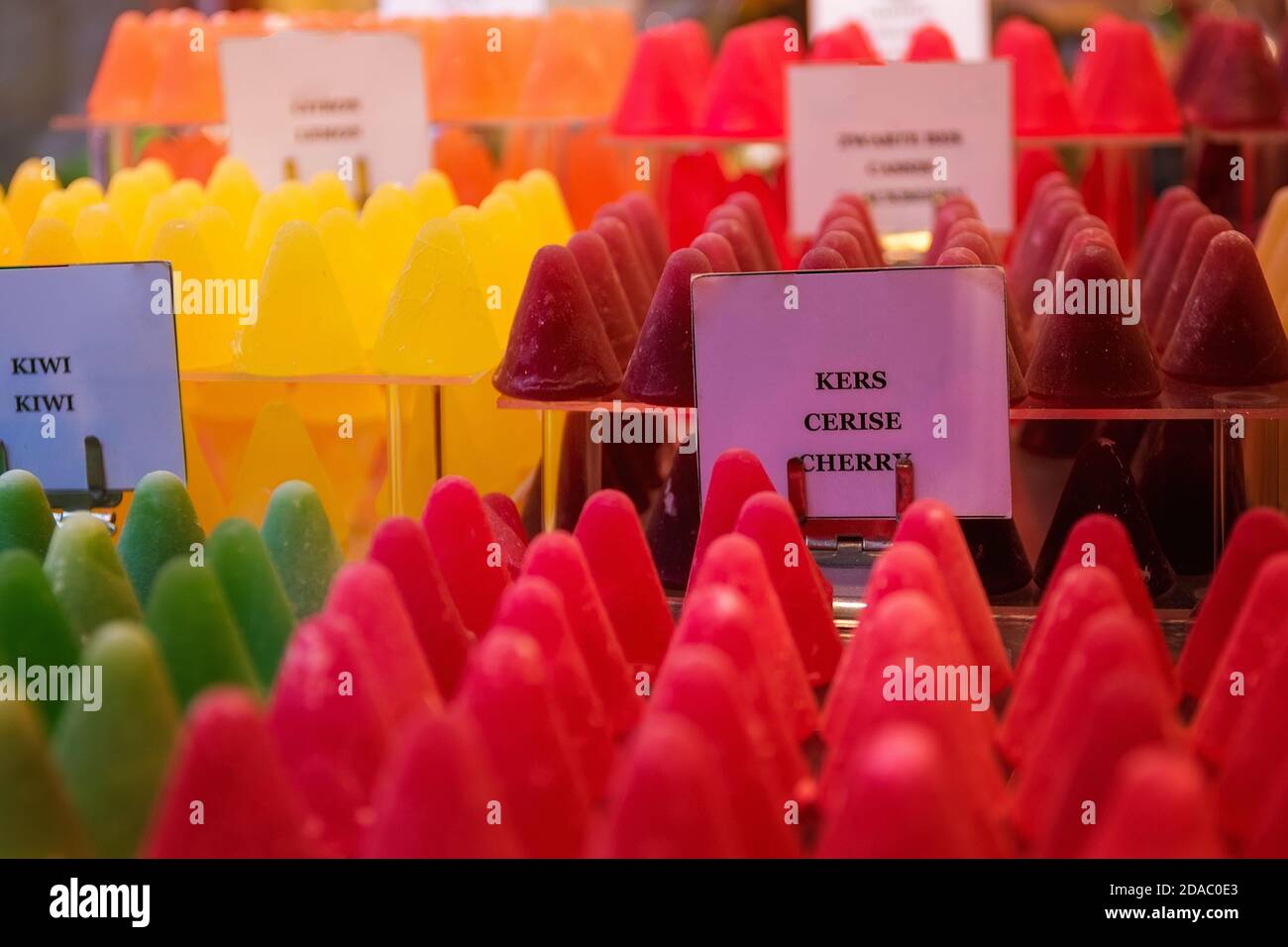 Selective focus shot of Belgian marmalades of various flavors in the