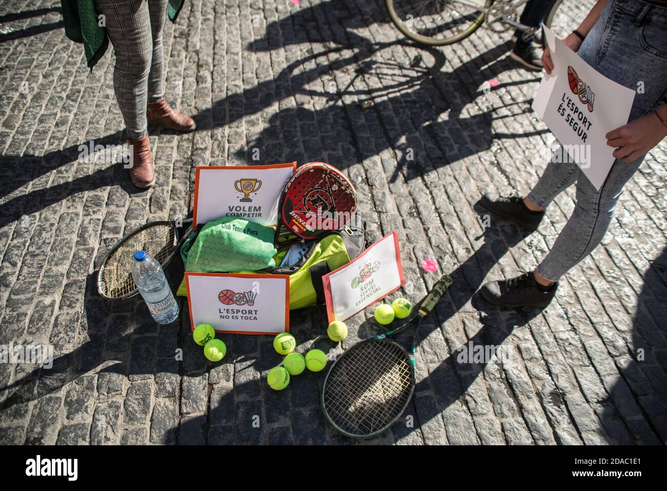 November 11, 2020: Racket and tennis balls are seen in demonstration.Catalan sports federations and entities have demonstrated in Barcelona to demand the reopening of gyms and sports facilities in Catalonia Credit: Thiago PrudÃªNcio/DAX/ZUMA Wire/Alamy Live News Stock Photo
