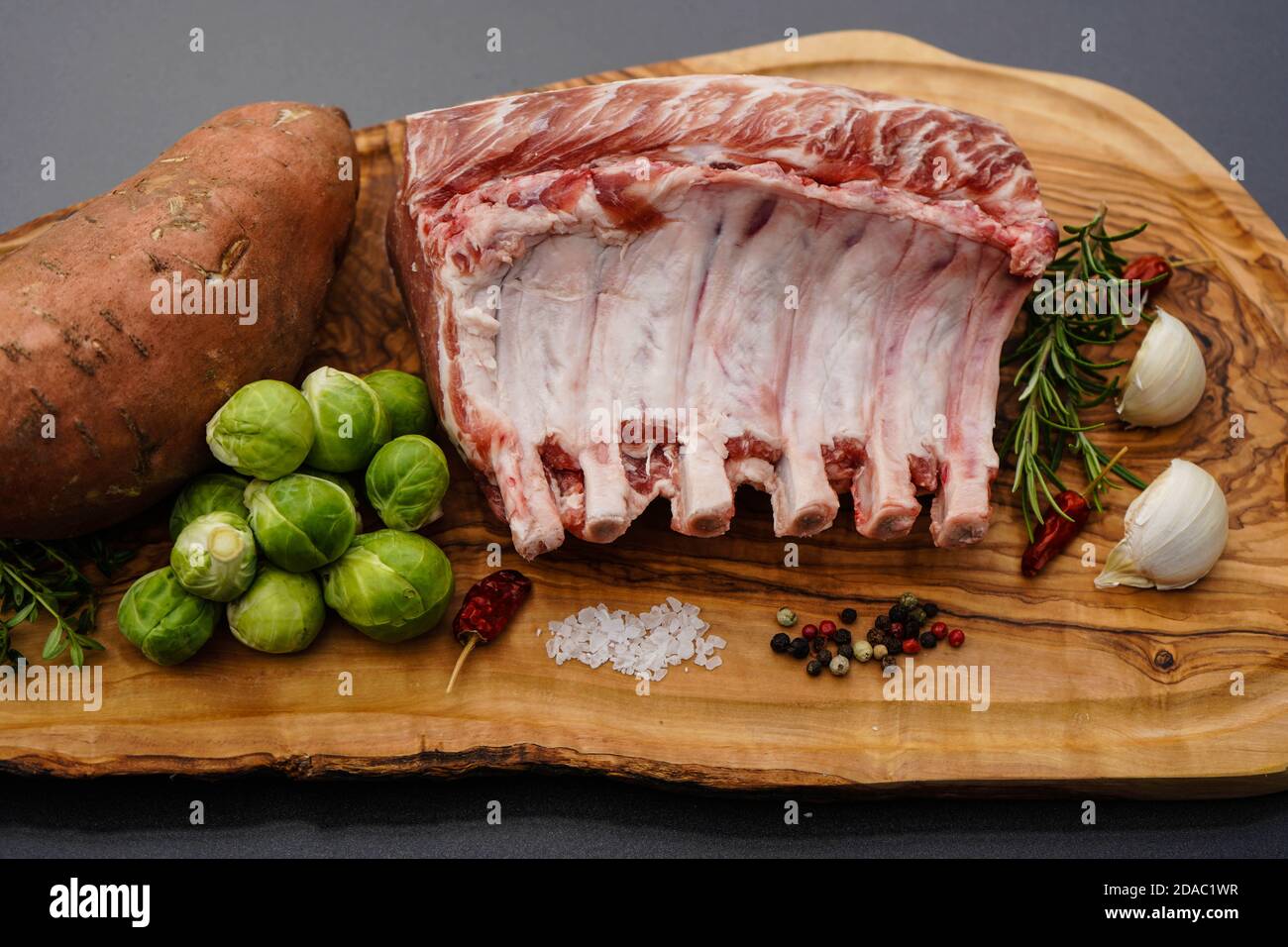 marinated french racks Iberico carree for barbecue Stock Photo - Alamy