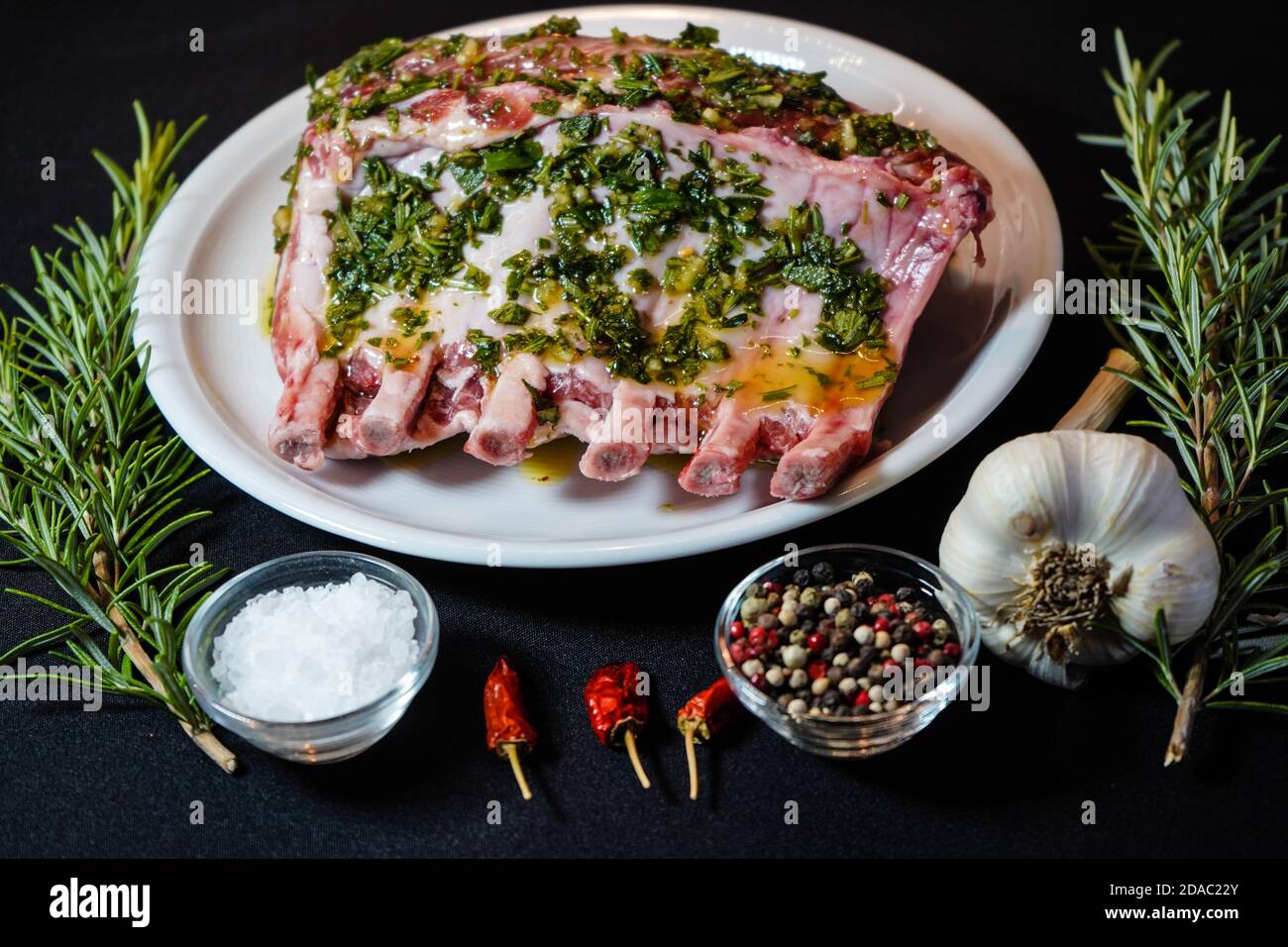 marinated french racks Iberico carree for barbecue Stock Photo - Alamy