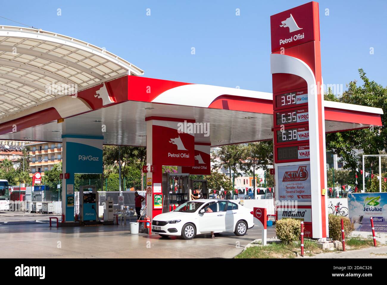 Alanya, Turkey-circa Oct, 2020: Red petrol station of the Ofisi company is in center of city. The Petrol Ofisi is a fuel products distribution and lub Stock Photo