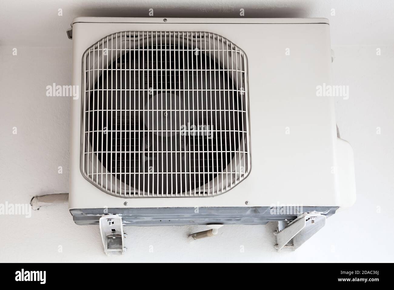 External part of split system air conditioning unit mounted on wall