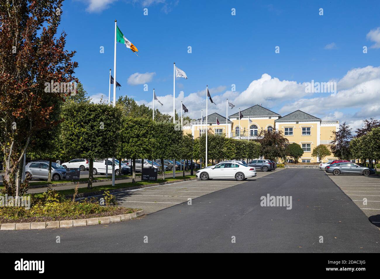 Car park and club house at the golf club at Palmerstown House, Johnstown, County Kildare, Ireland Stock Photo