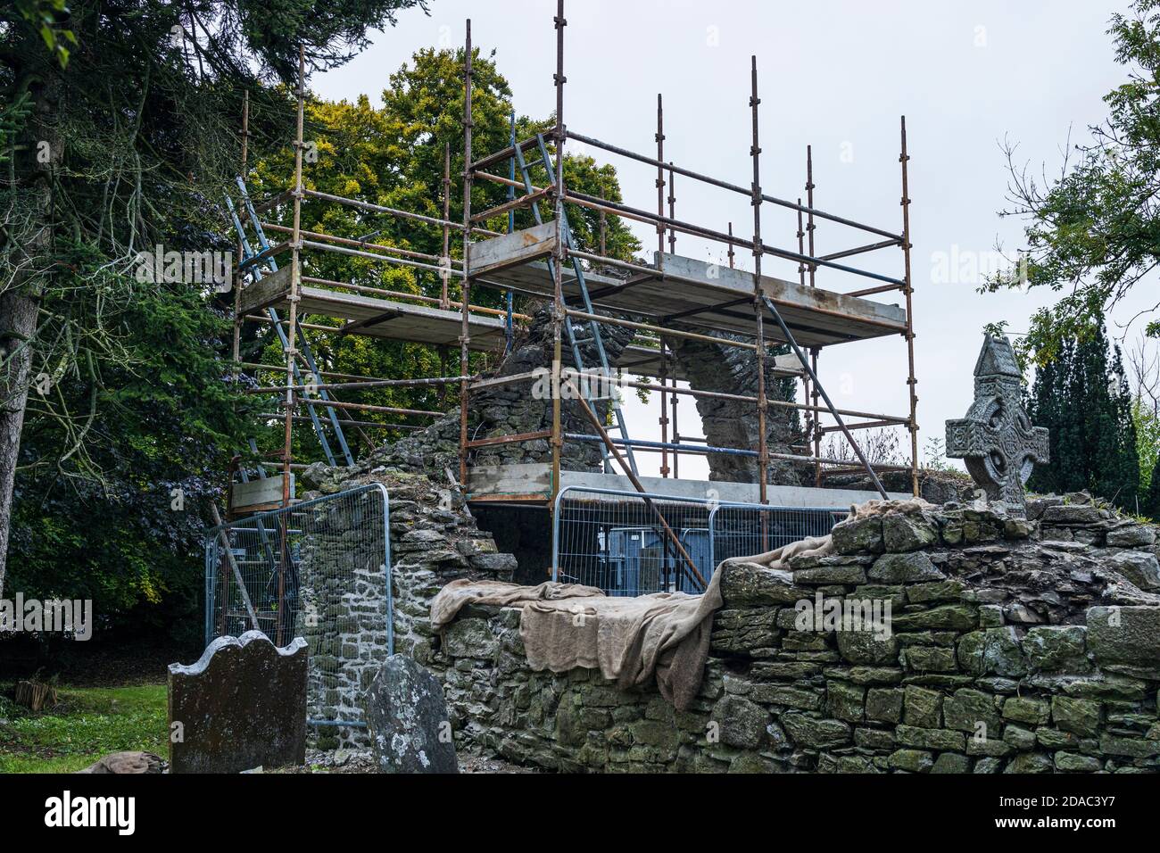 Scaffolding around the arch of a medieval ruin, old church and