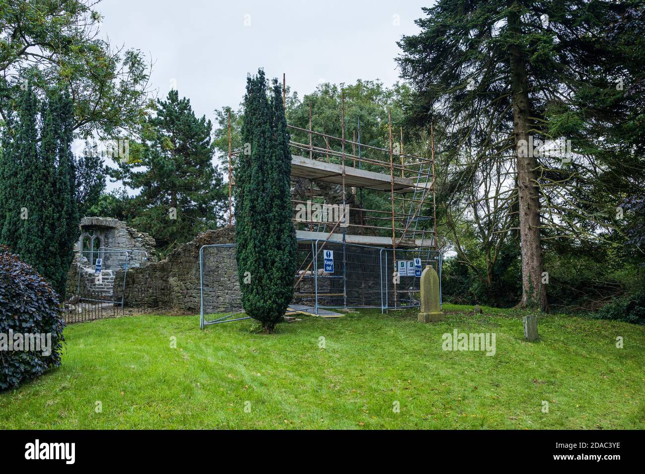 Scaffolding around the arch of a medieval ruin, old church and