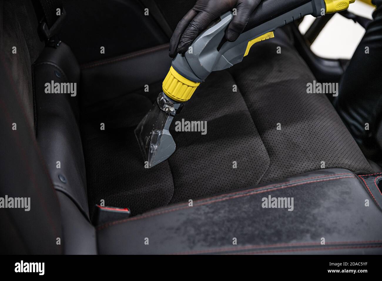 Man Does Car Upholstery Cleaning Professional Chemical Cleaning