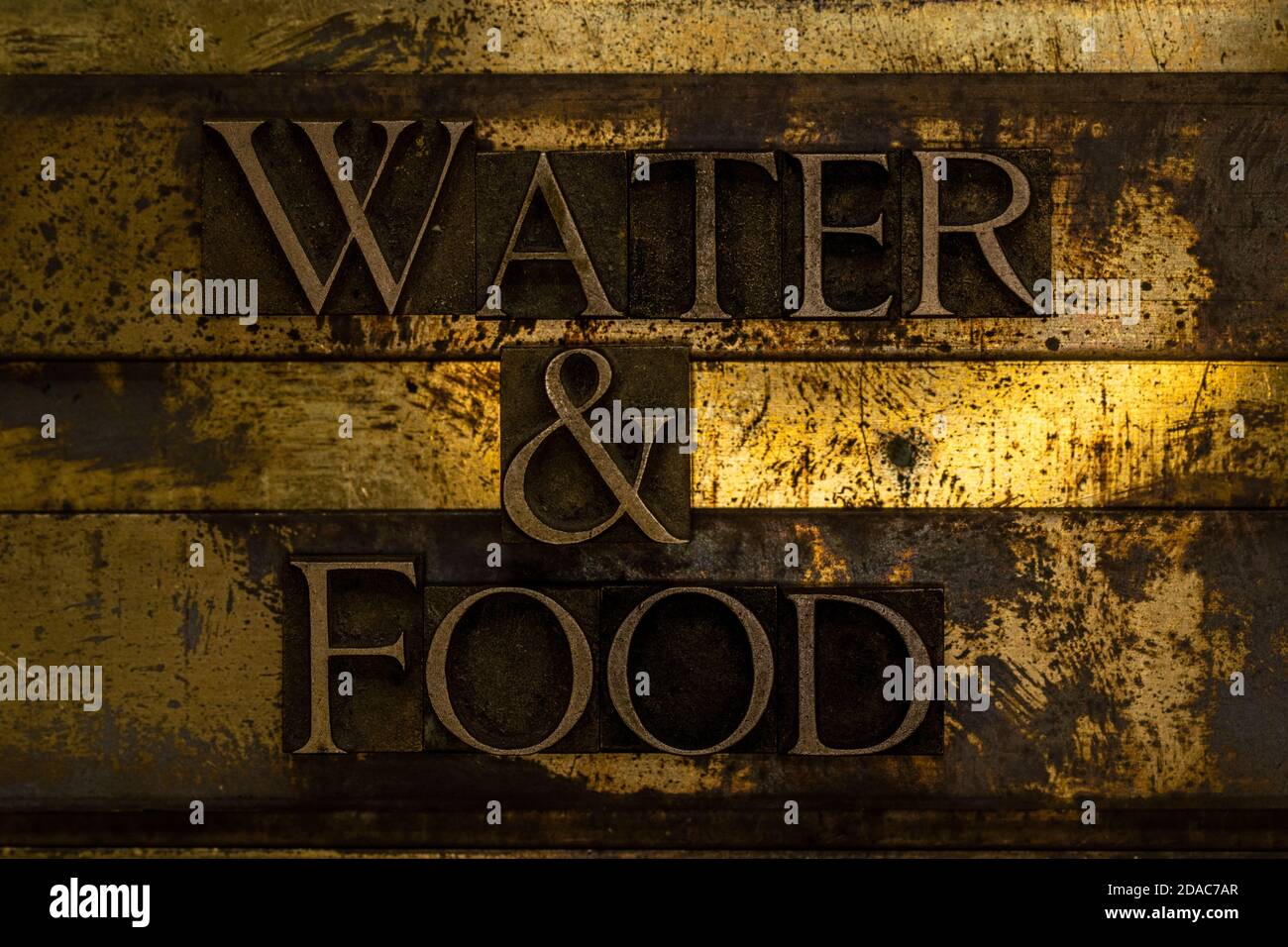 Water & Food text message on vintage textured grunge copper background Stock Photo