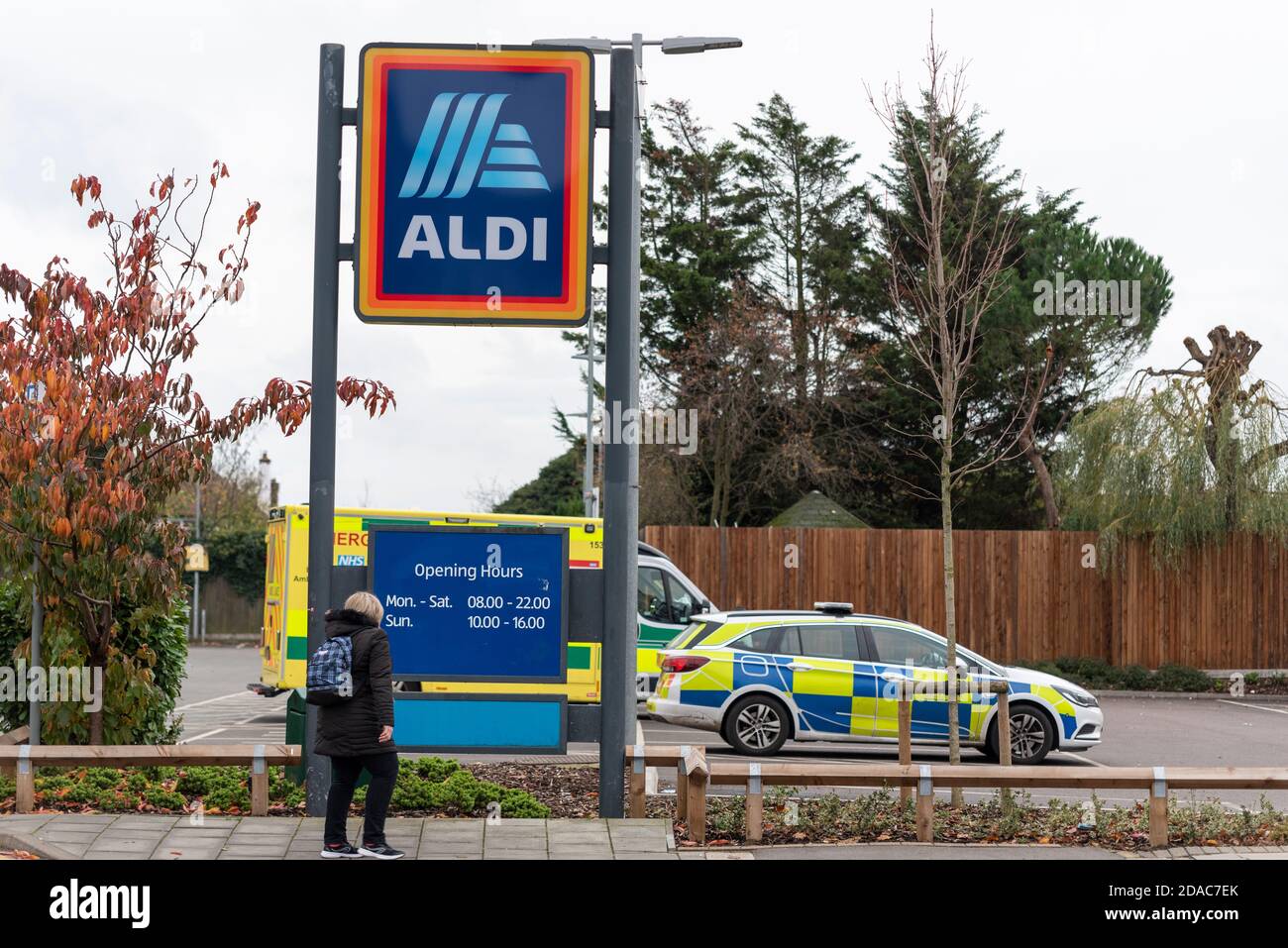 Police and ambulances have attended an Aldi store in Westcliff on Sea, Essex, UK, due to a fatality. Person looking at opening hours Stock Photo