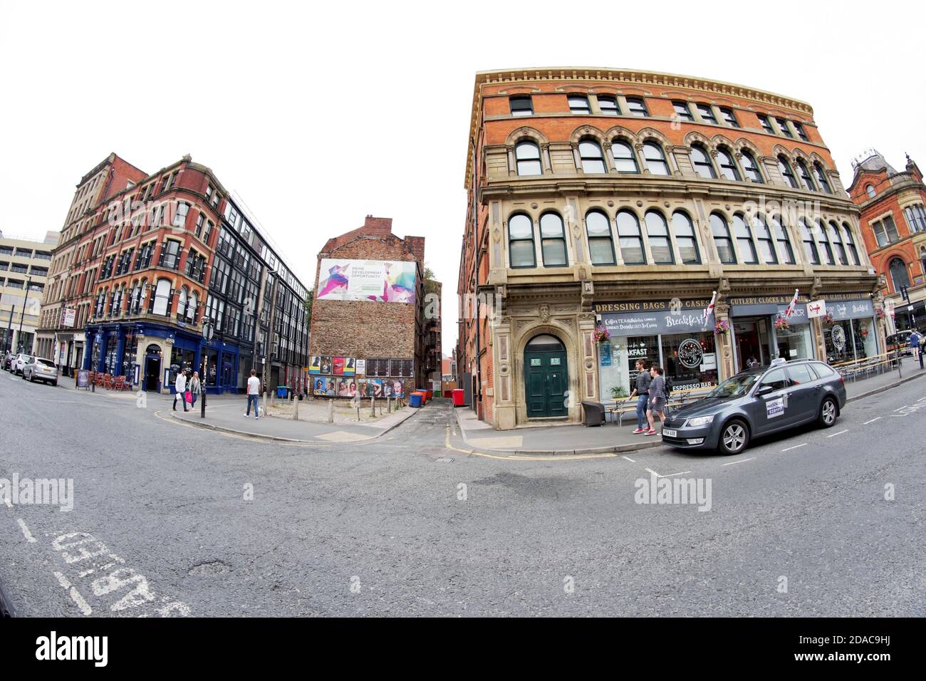 High Street, in Manchester's Bohemian Northern Quarter. Looking towards the alleyways of Soap Street and Back Turner Street, close to the city centre. Stock Photo