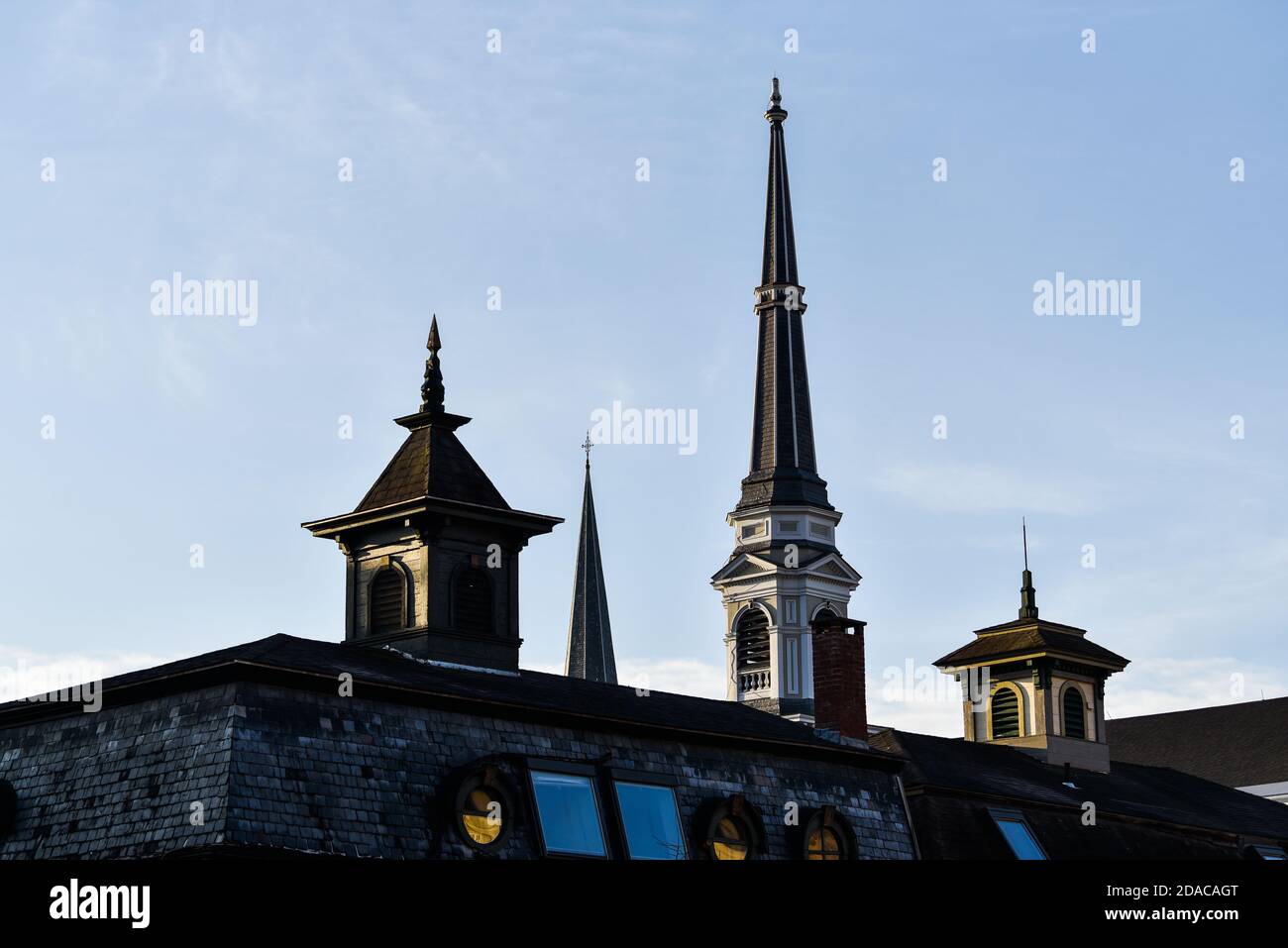 Roofline view shows the differences between cupolas and steeples, in Montpelier, capital of Vermont, New England, USA. Stock Photo