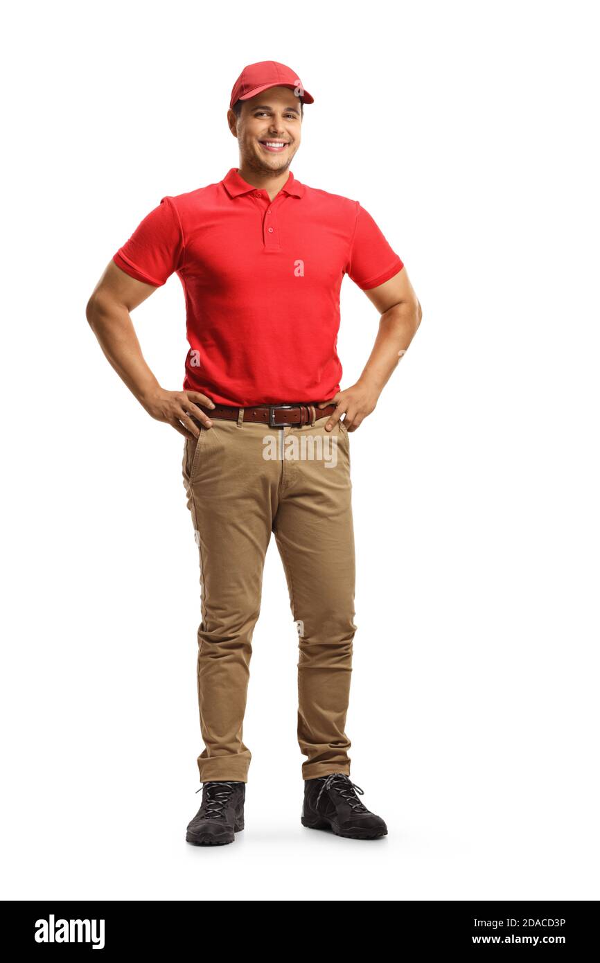 Full length portrait of a cheerul young male worker in a uniform posing isolated on white background Stock Photo