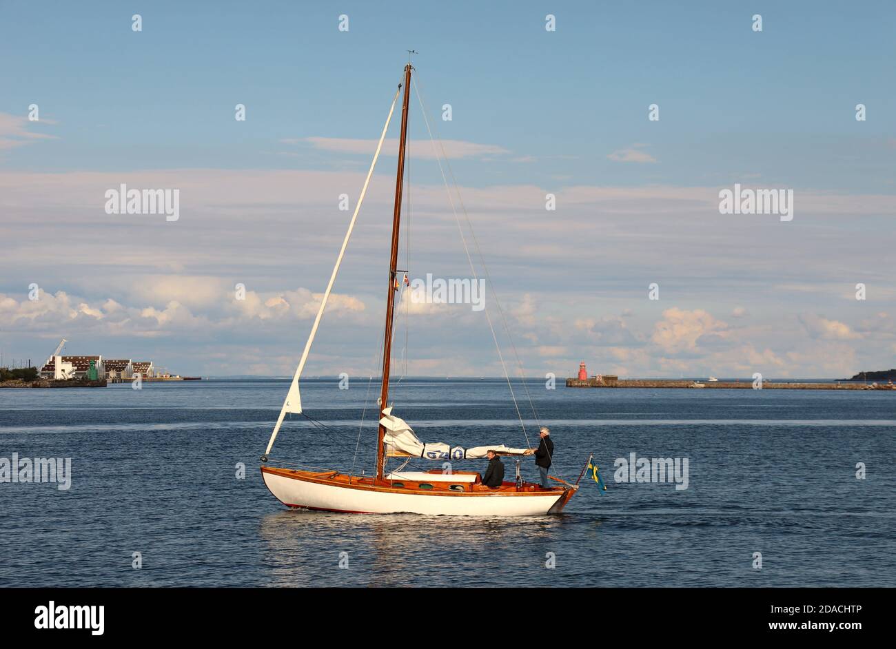 Pleasure craft sailing by Copenhagen waterfront Stock Photo Alamy