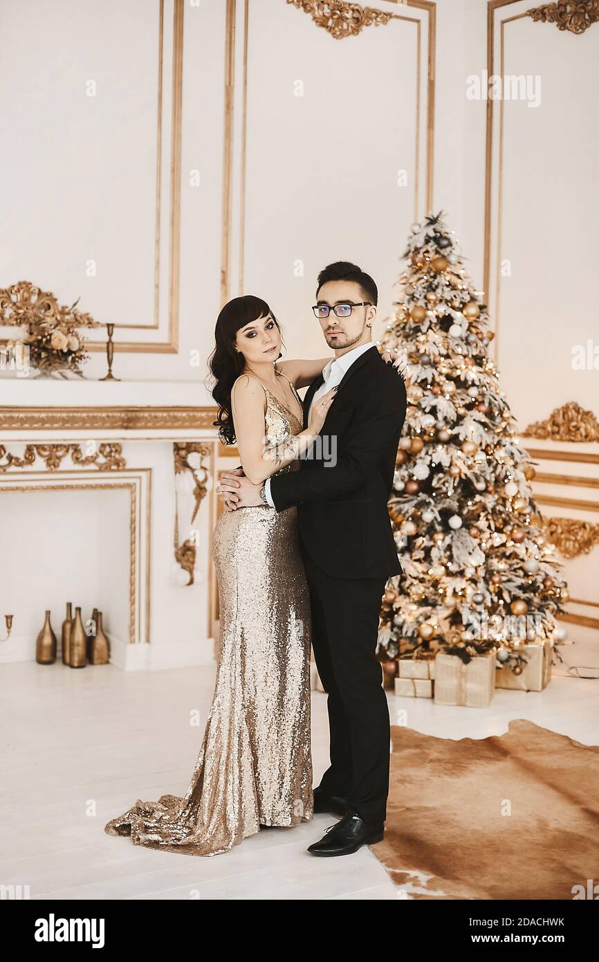 Couples christmas suits and dresses top