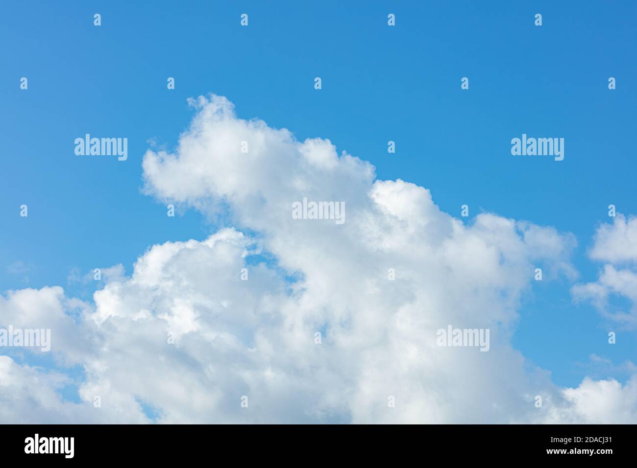Beautiful blue sky with a big white cloud Stock Photo - Alamy