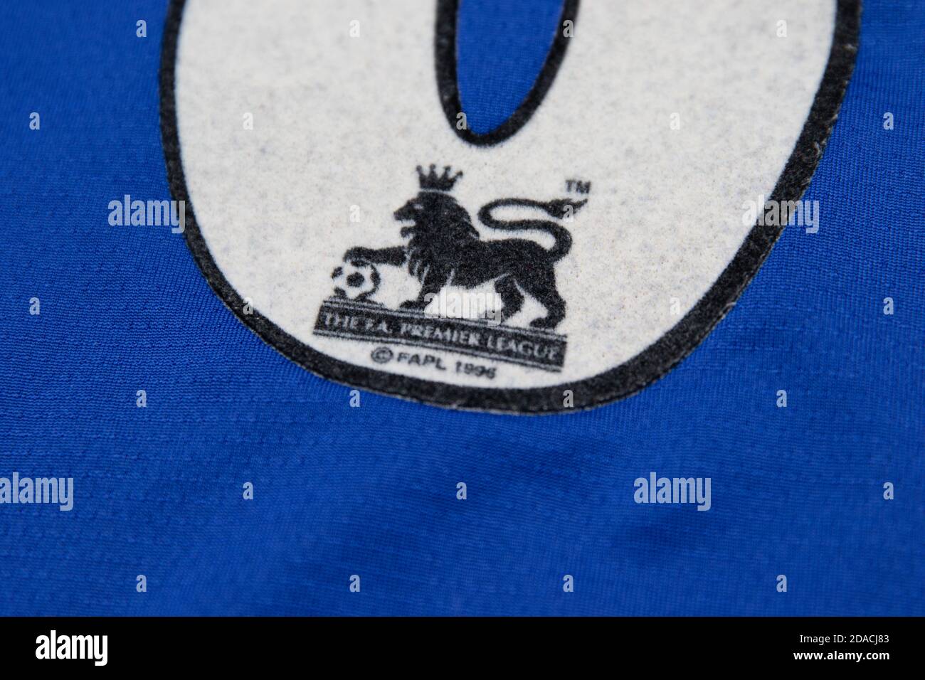 FA Premier League 1996 Lion with Football logo inset within a number on the back of a blue football shirt Stock Photo