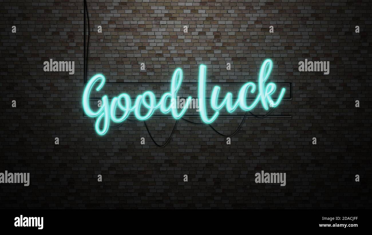 The message 'Good luck'  neon light on Brick wall bcakground Stock Photo
