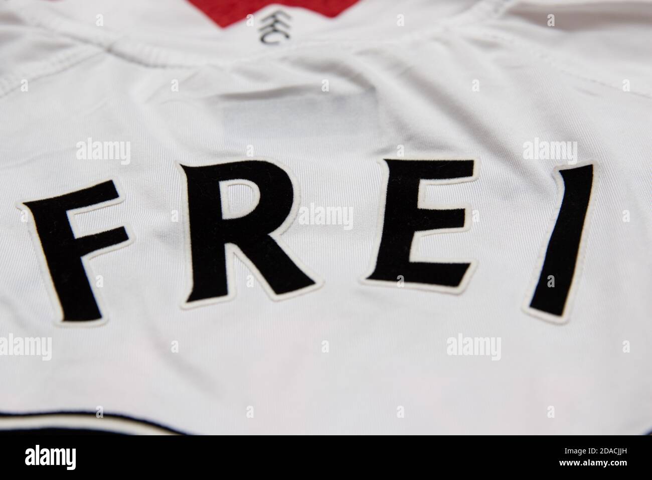 Kerim Frei Surname on the back of a white Fulham FC home shirt Stock Photo