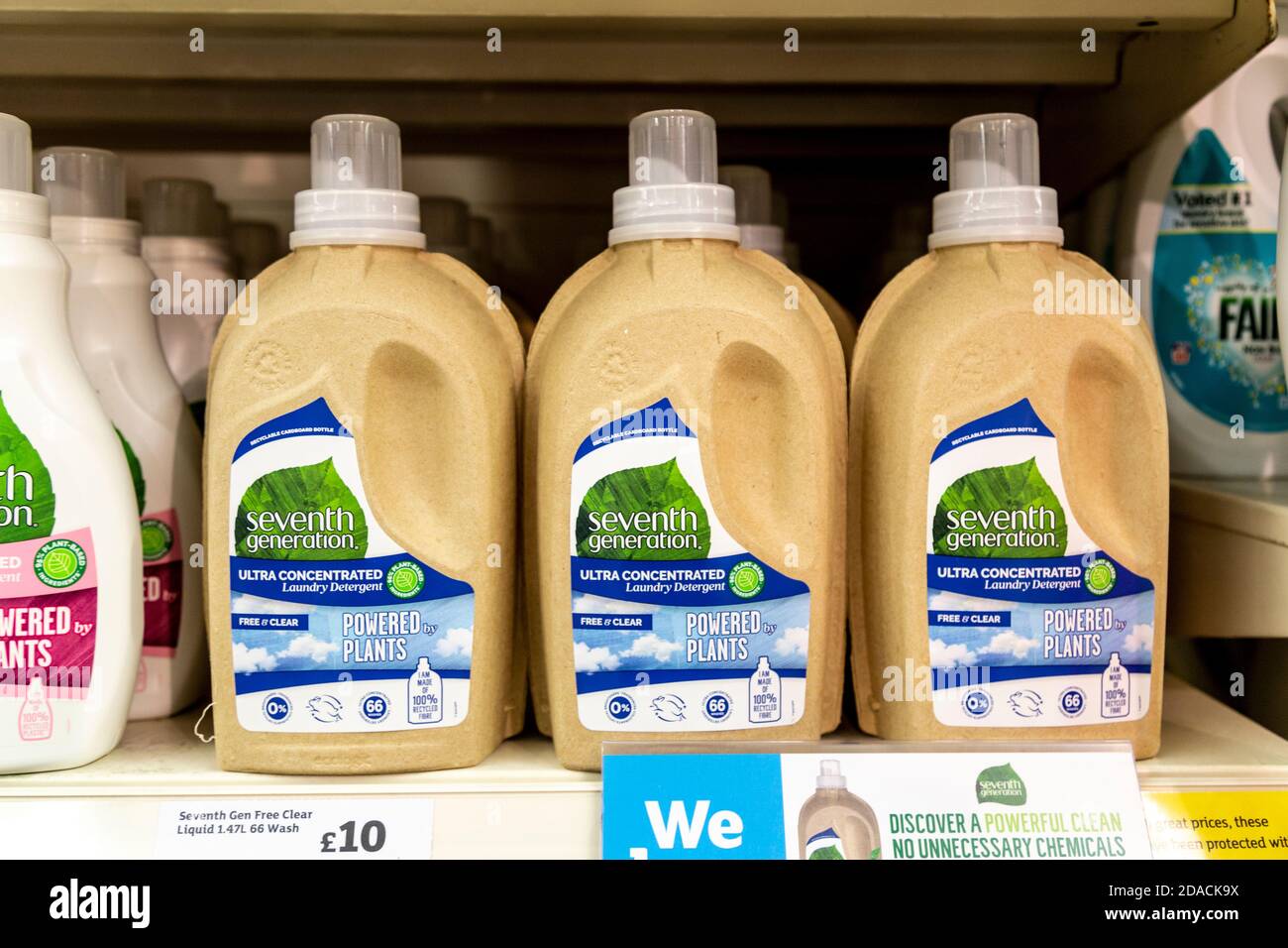 Seventh Generation laundry detergent in bottles made from recycled fibre on supermarket shelf, London, UK Stock Photo