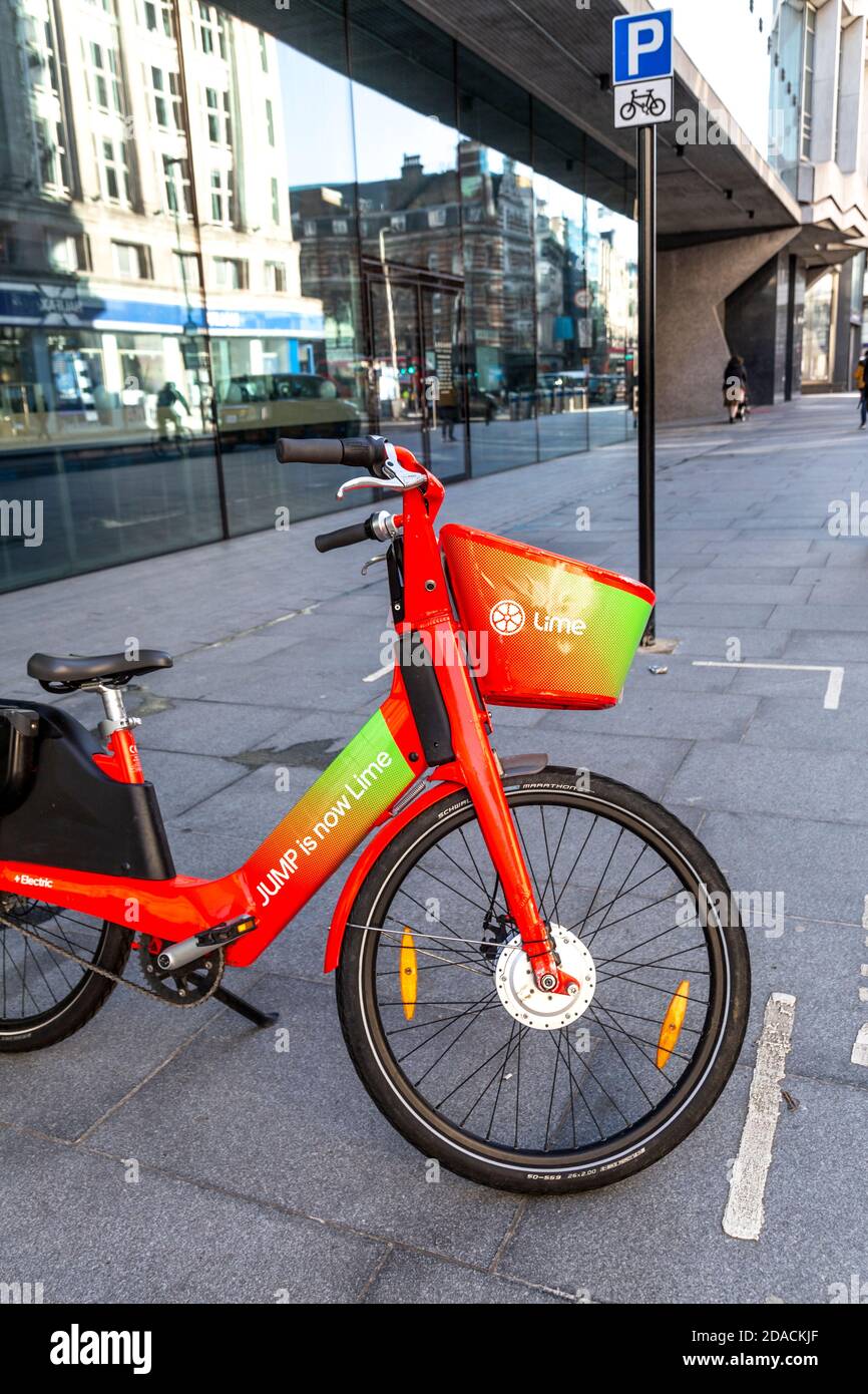 Dockless JUMP electric bicycle rebranded by Lime after taking over from Uber in London, UK Stock Photo