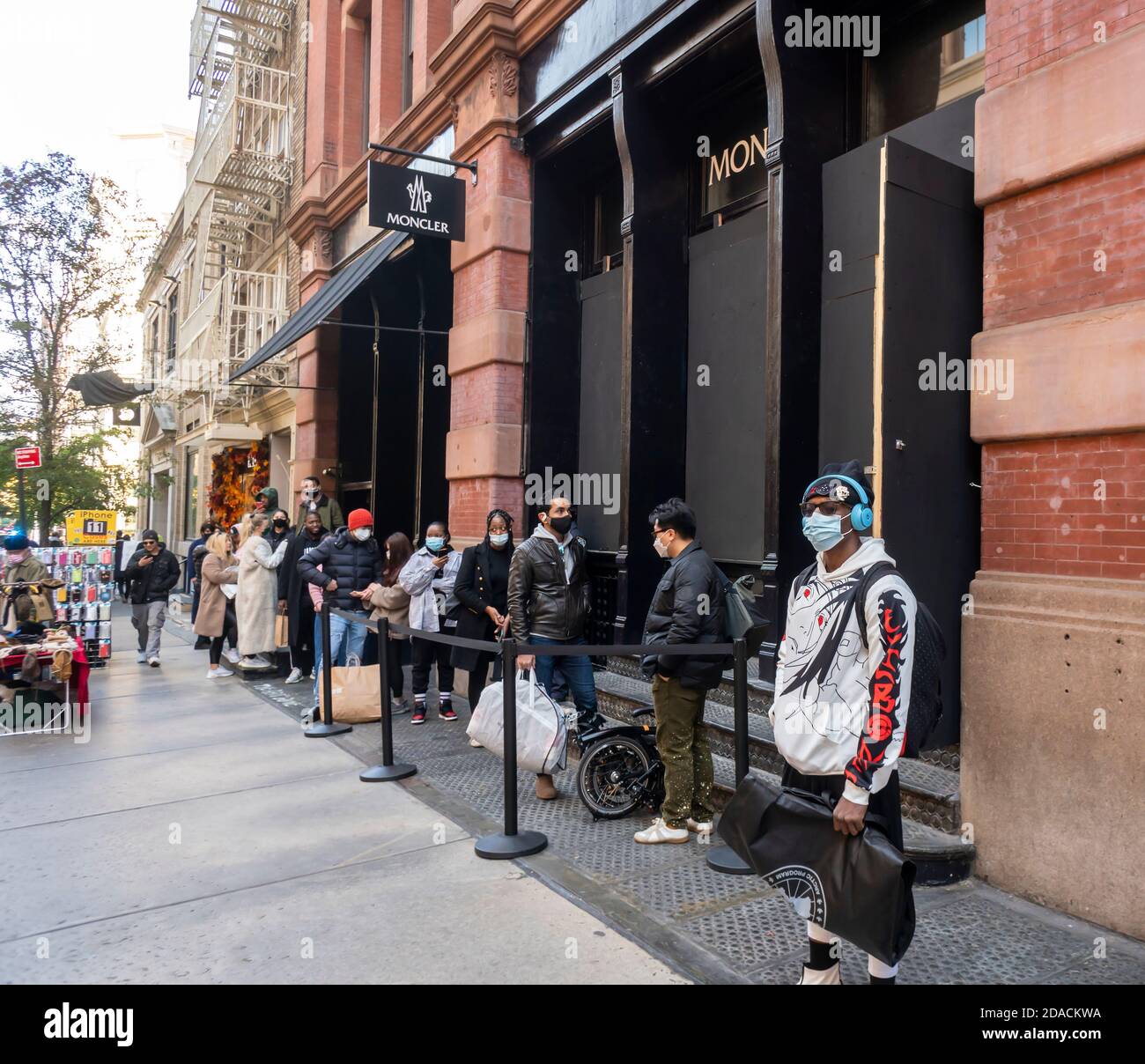 Moncler and other boutiques and stores in Soho in New York on Saturday,  October 31, 2020 board up their windows in anticipation of possible civil  unrest and lotting after the election on