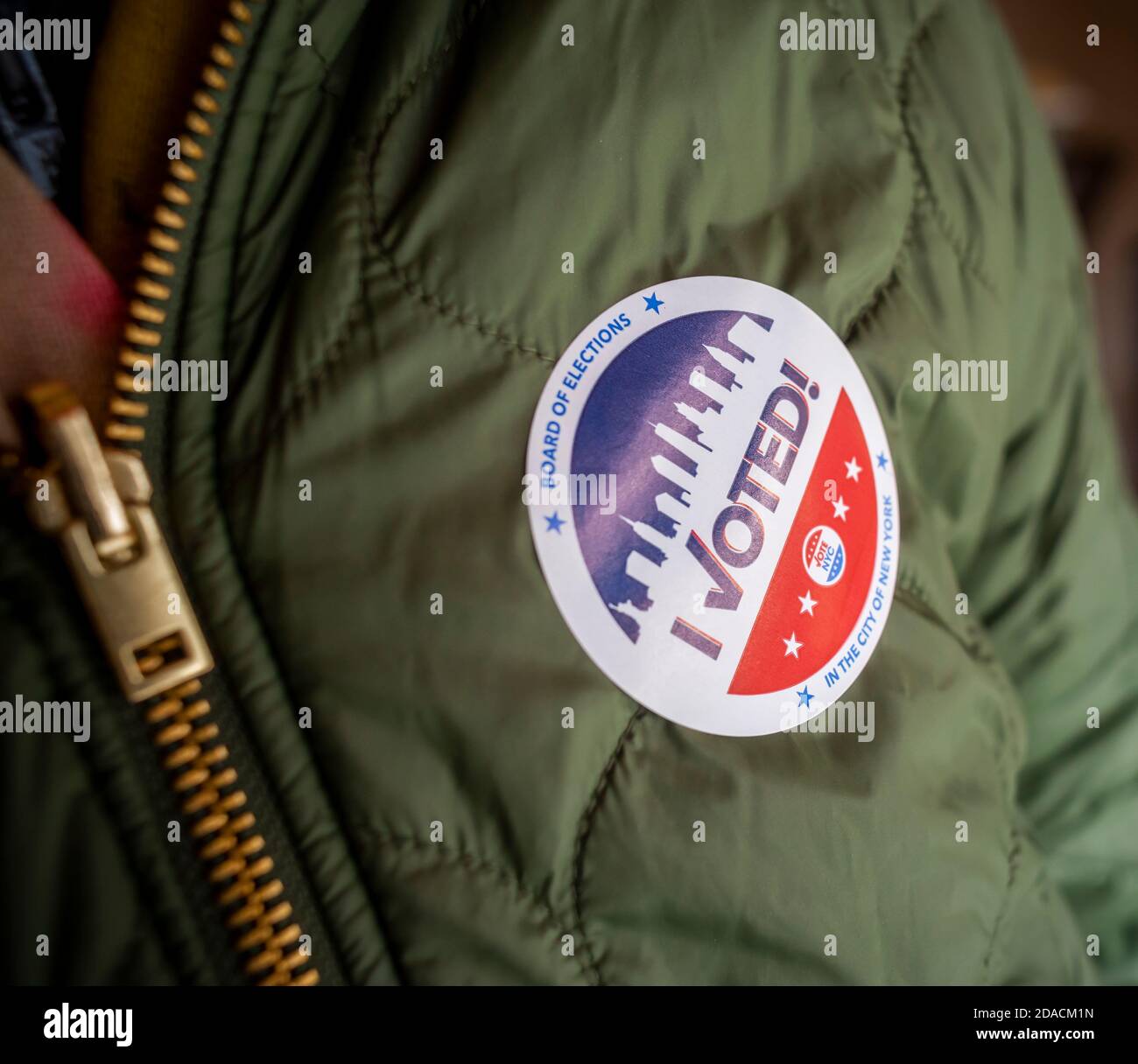 A voter wears her 'I Voted' sticker on Election Day in New York on Tuesday, November 3, 2020. (© Richard B. Levine) Stock Photo
