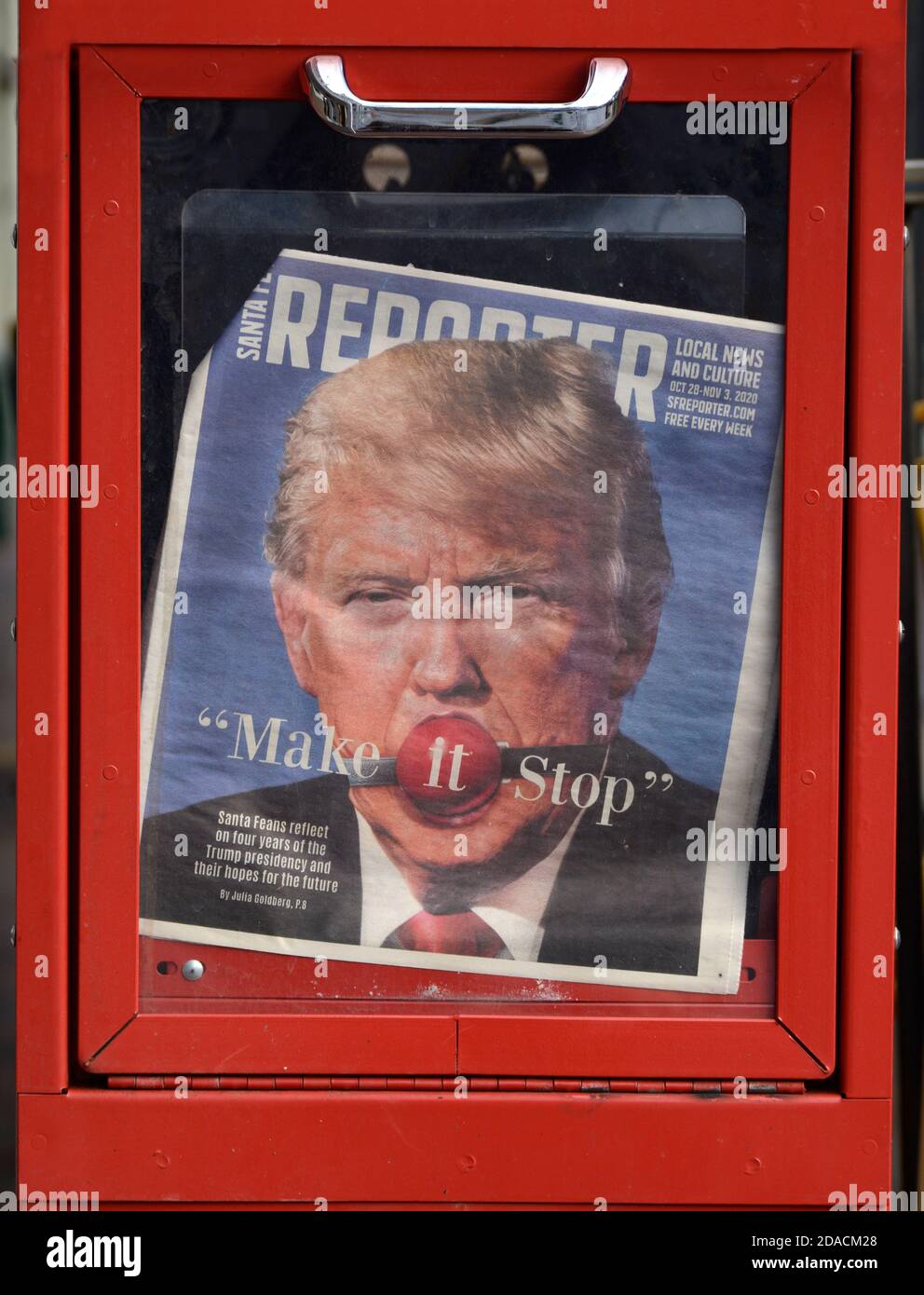 A free weekly tabloid newspaper distributed in Santa Fe, New Mexico, features a critical cover story on U.S. President Donald Trump. Stock Photo