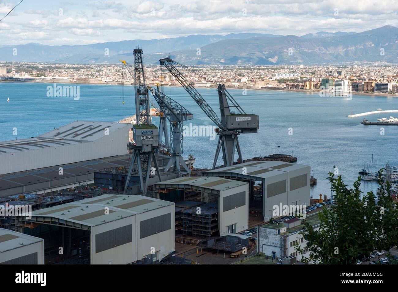 View on Fincantieri shipyard with cranes, coils, from Castellamare di Stabia, Naples Stock Photo