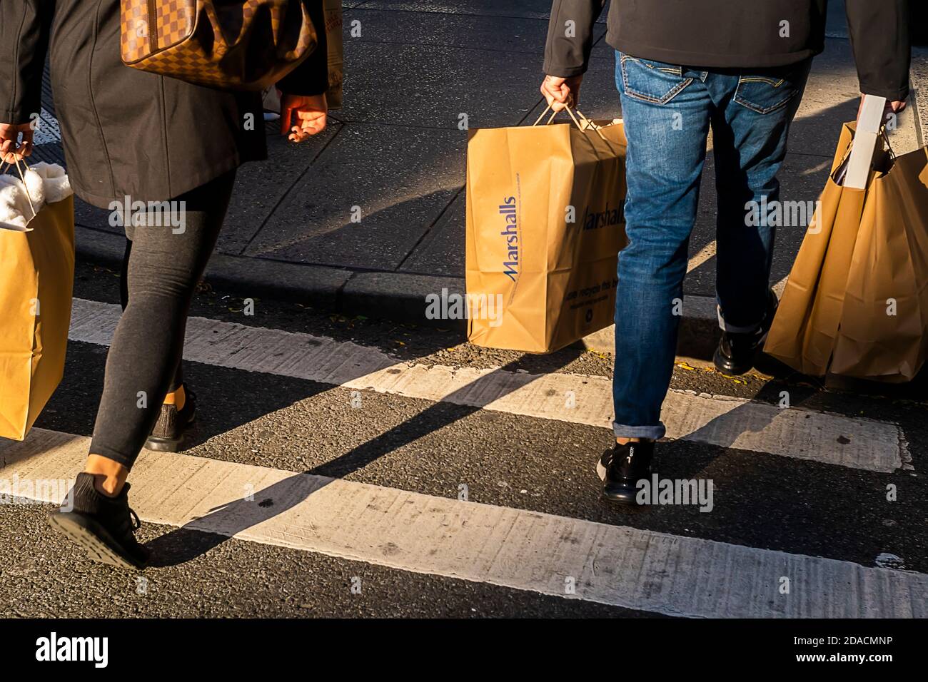 Shoppers exit the Marshalls store in Chelsea New York on Wednesday, November 4, 2020. (© Richard B. Levine) Stock Photo