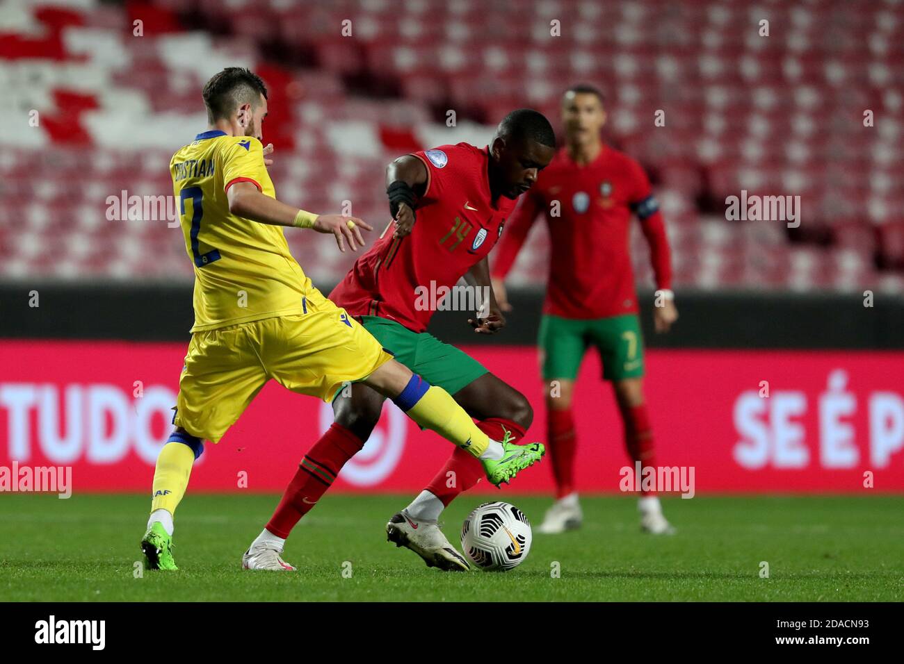 Lisbon, Portugal. 11th Nov, 2020. William Carvalho of Portugal (R ) vies with Cristian Martinez of Andorra during the friendly football match between Portugal and Andorra, at the Luz stadium in Lisbon, Portugal, on November 11, 2020. Credit: Pedro Fiuza/ZUMA Wire/Alamy Live News Stock Photo