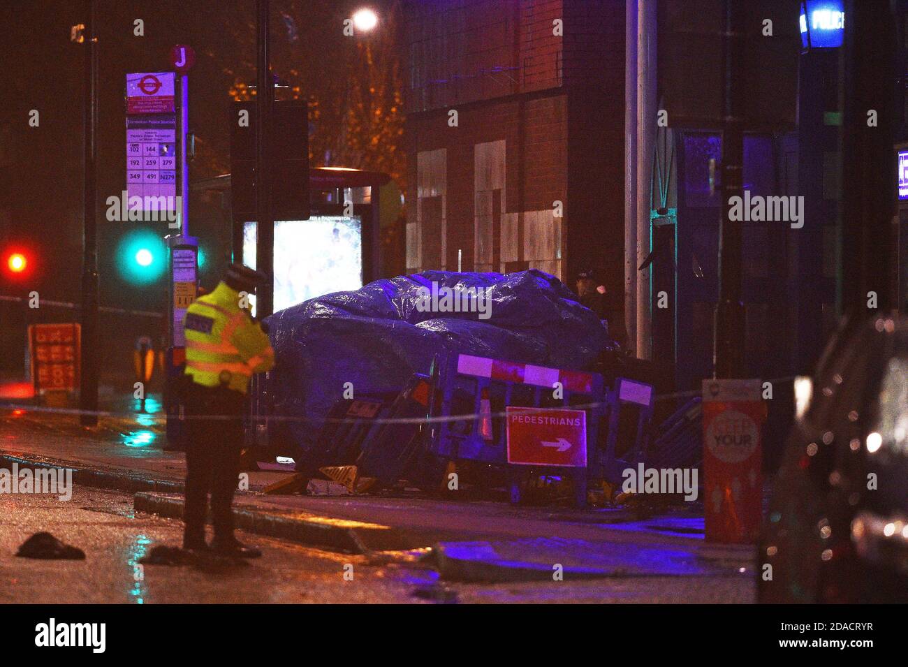 The scene at Edmonton Police Station in Enfield, north London, where a man  has been arrested after a vehicle collided with the station office Stock  Photo - Alamy