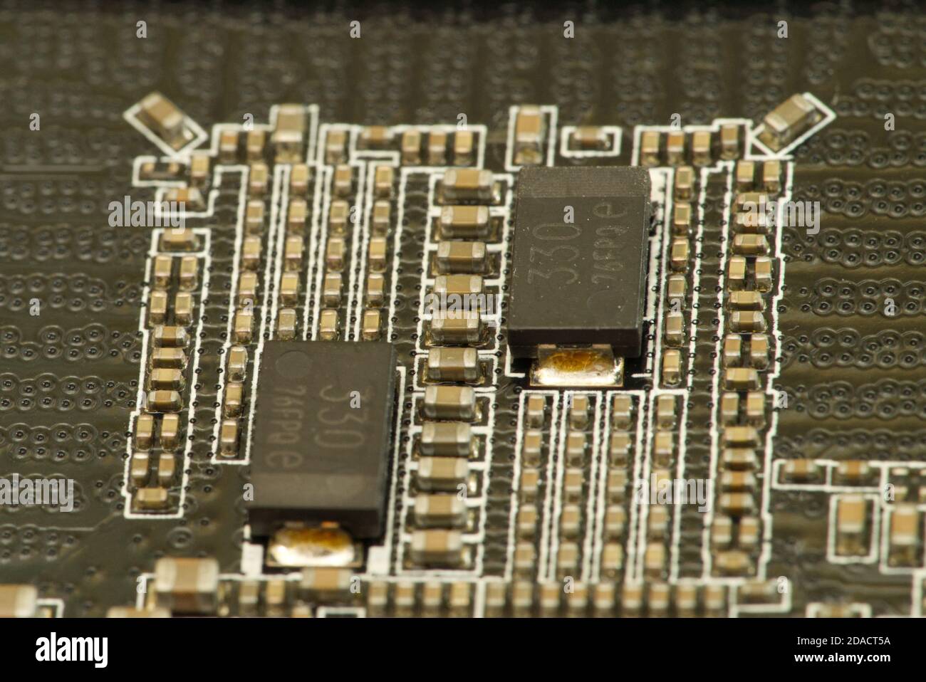 various chips on a textolite video card board for a modern desktop computer Stock Photo