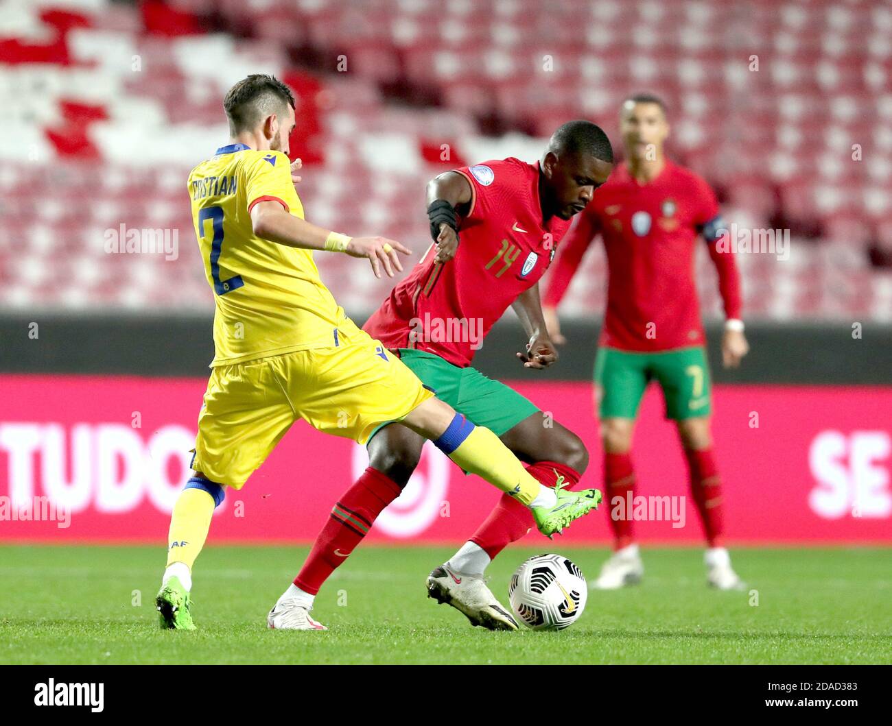 Lisbon, Portugal. 11th Nov, 2020. William Carvalho (front R) of Portugal vies with Cristian Martinez of Andorra during a friendly football match at the Luz stadium in Lisbon, Portugal, on Nov. 11, 2020. Credit: Pedro Fiuza/Xinhua/Alamy Live News Stock Photo