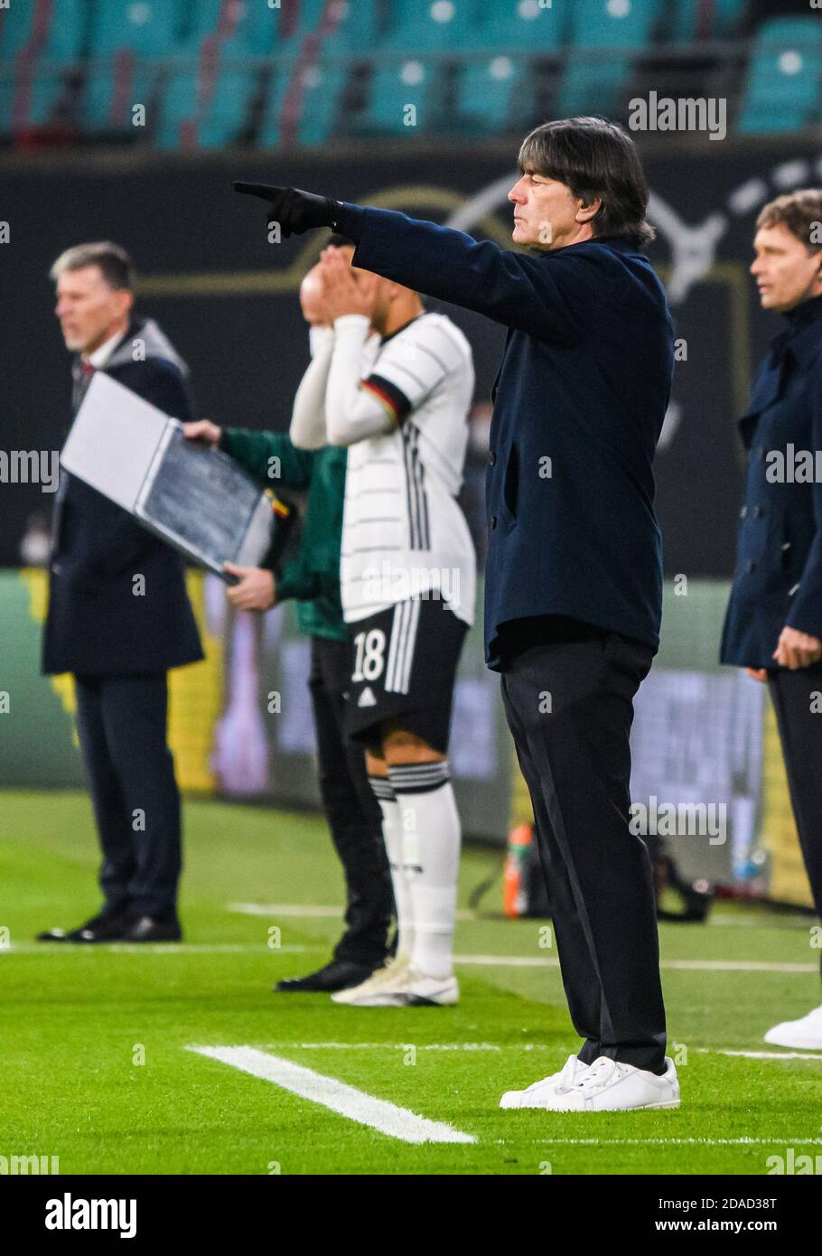 Leipzig, Germany. 11th Nov, 2020. Germany's head coach Joachim Loew (front) gestures during a friendly football match between Germany and the Czech Republic in Leipzig, Germany, Nov. 11, 2020. Credit: Kevin Voigt/Xinhua/Alamy Live News Stock Photo