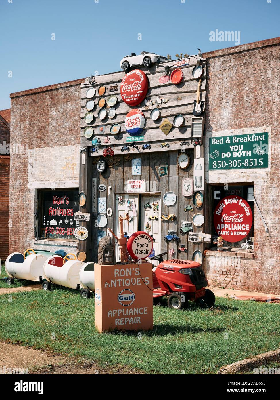 Small town unique or funky appliance repair and antique store exterior in Florala Alabama, USA. Stock Photo