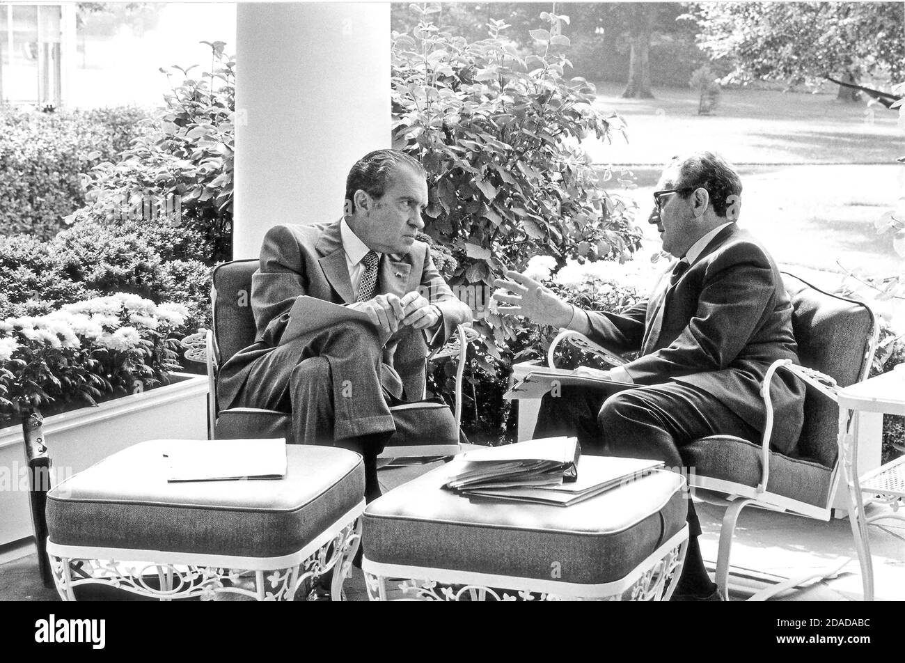 In this photo released by the White House, United States President Richard M. Nixon, left, meets with his National Security Advisor, Doctor Henry A. Kissinger, right, on the Colonnade outside the Oval Office in the White House in Washington, DC on September 16, 1972.Credit: White House via CNP | usage worldwide Stock Photo