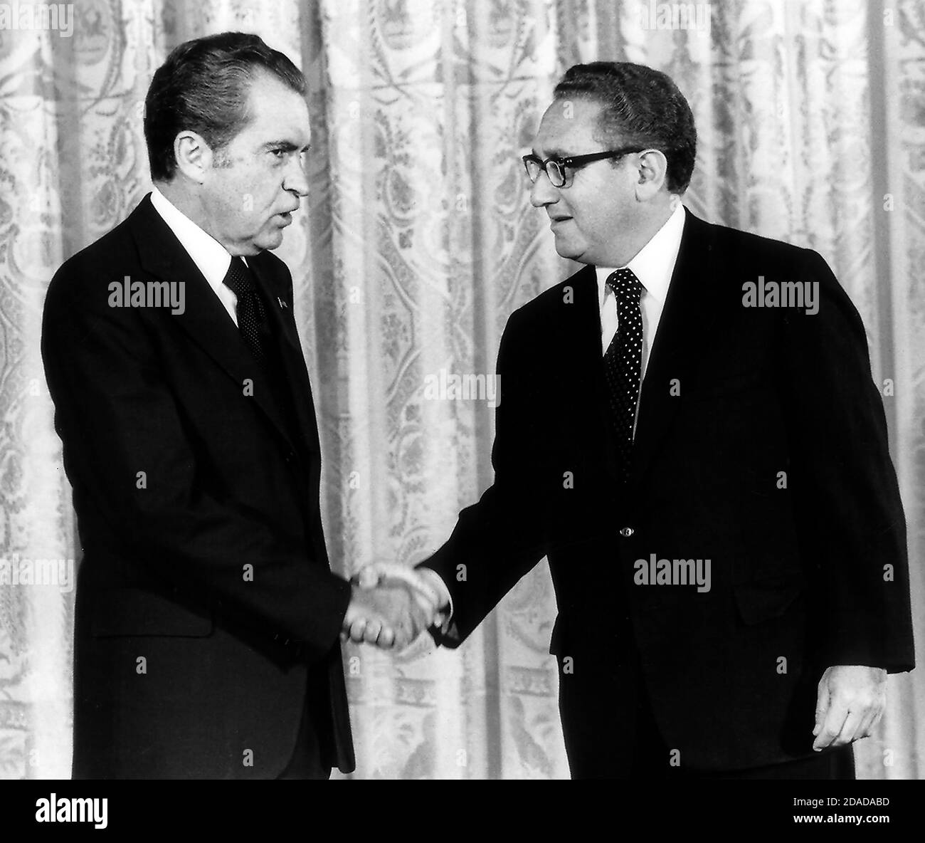 United States President Richard M. Nixon congratulates Henry A. Kissinger after Kissinger was sworn-in as the 56th United States Secretary of State in the East Room of the White House on September 22, 1973. Kissinger will continue to serve as National Security Advisor. He is the first naturalized citizen to serve as Secretary of State.Credit: Benjamin E. 'Gene' Forte - CNP | usage worldwide Stock Photo