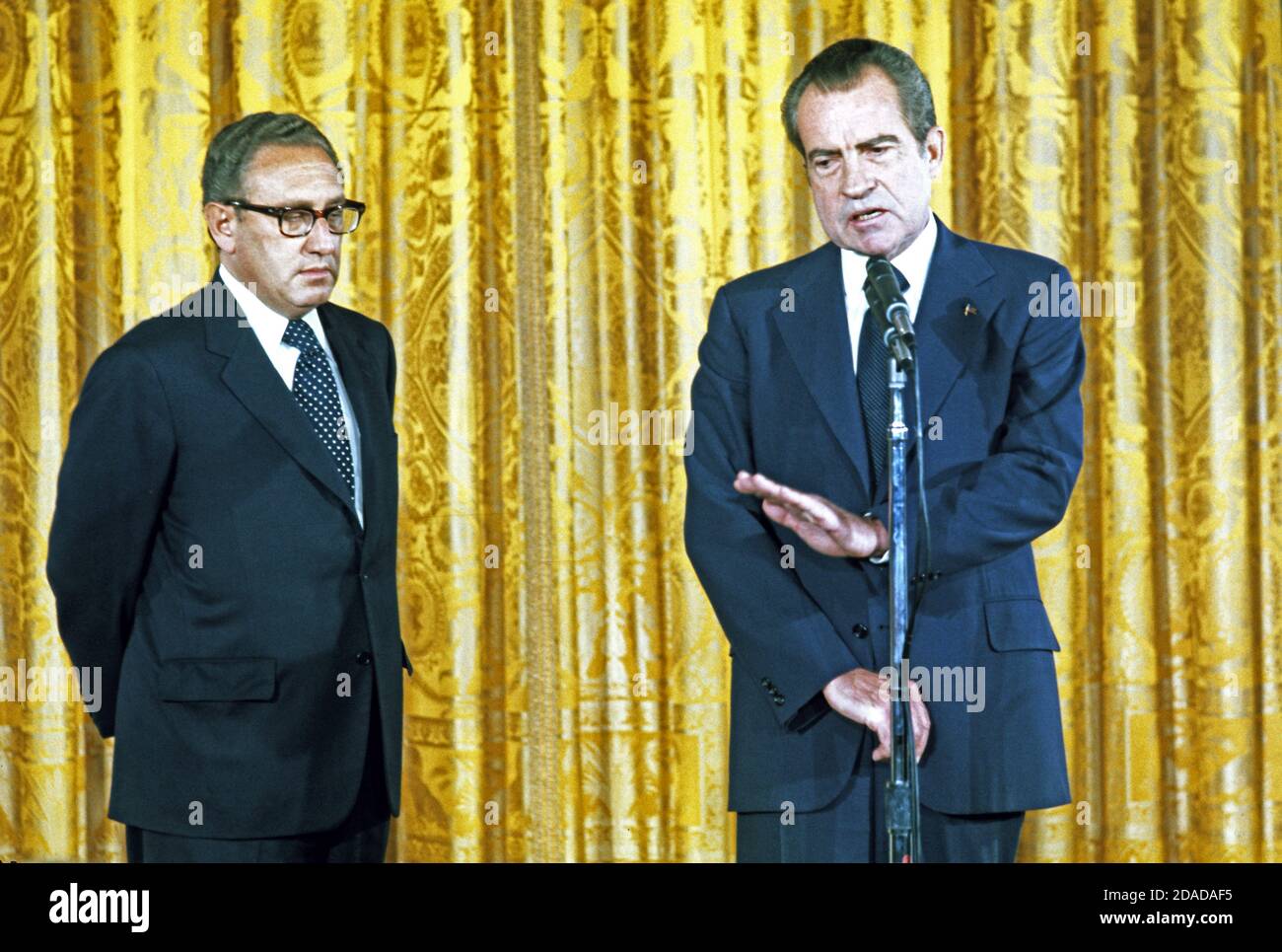 United States President Richard M. Nixon, right, makes remarks prior to Henry A. Kissinger, left, being sworn-in as the 56th United States Secretary of State in the East Room of the White House on September 22, 1973. Kissinger will continue to serve as National Security Advisor. He is the first naturalized citizen to serve as Secretary of State.Credit: Benjamin E. 'Gene' Forte - CNP | usage worldwide Stock Photo