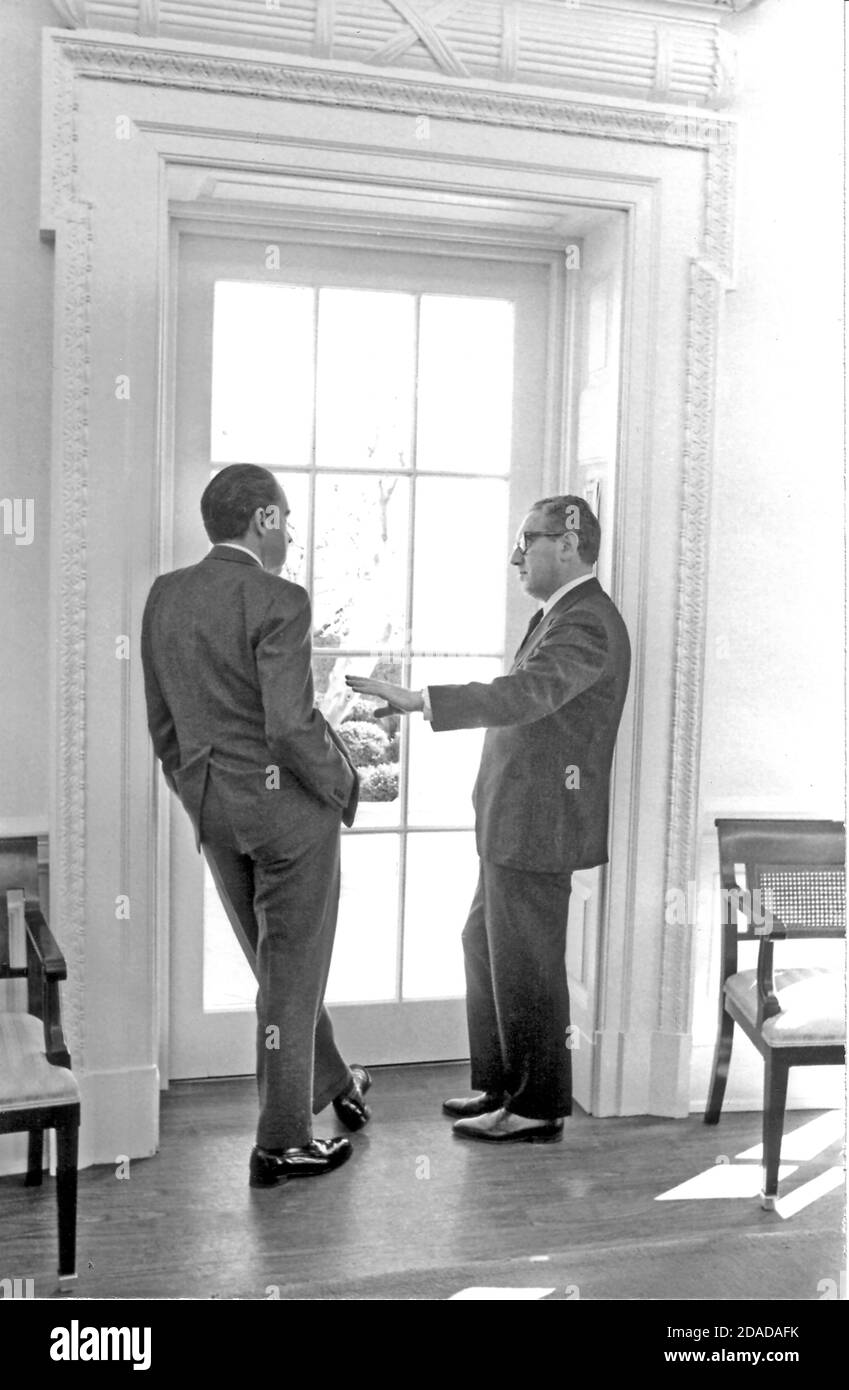 In this photo released by the White House, United States President Richard M. Nixon, left, meets with his National Security Advisor, Doctor Henry A. Kissinger, right, in the Oval Office in the White House in Washington, DC on February 10, 1971.Credit: White House via CNP | usage worldwide Stock Photo